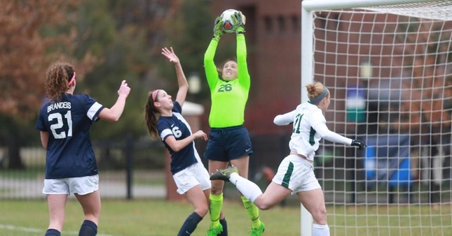 Alexis Grossman makes one of her four saves on the day (photo by Greg Searles)
