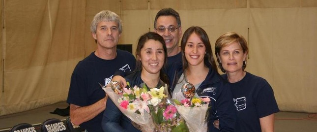 Si-Si Hensley '14 and her ffather, Scott, with Yael Einhorn '14 and her father Marty and mother Michal (photo by Jeff Boxer)